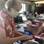 An older adult sewist creates surgical gowns for local hospitals in Baton Rouge.