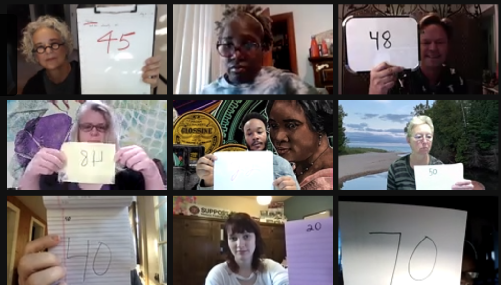 Teaching artists in Ohio hold up cards indicating how old they feel "internally."